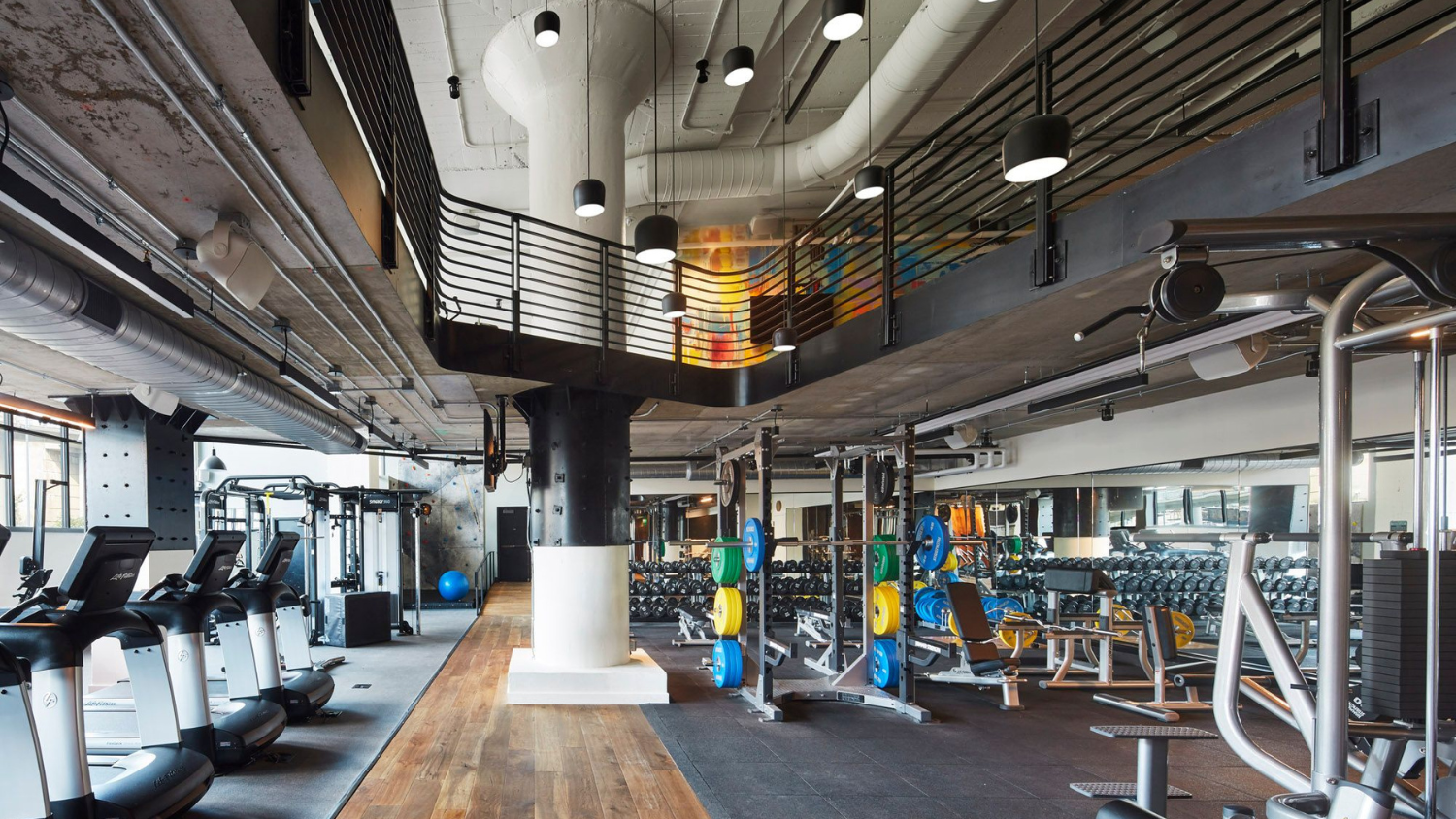 The Field House at Fitler Club featuring a gym and weights